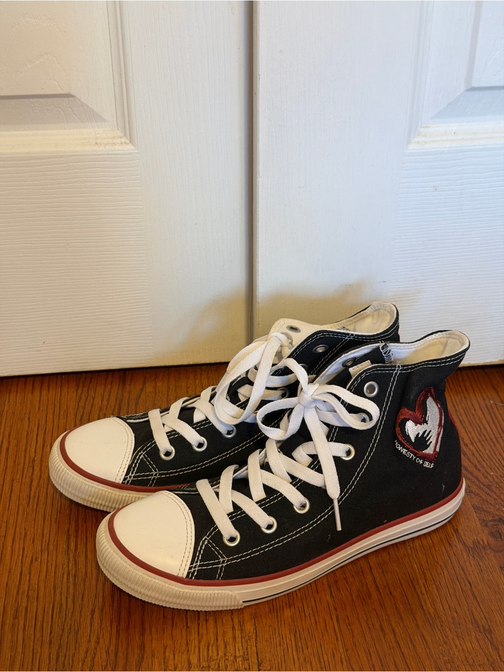 Black High-Top Kids Sneakers with Red Accent and Heart Patch